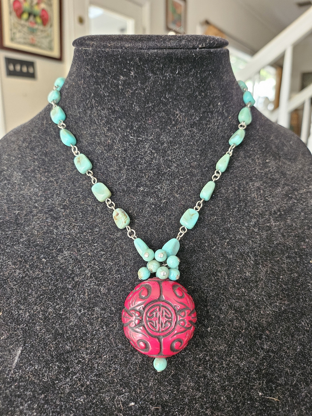 Turquoise Colored Bead Necklace with Red Carved Cinnabar Pendant